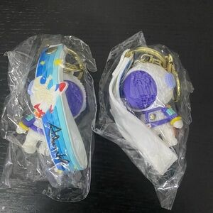 Bundle of two Astronauts keychain with wristlet bag charm